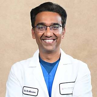 Dr. Pal Manickam