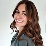 Dr. Emi Mawson