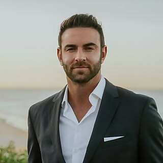 Cameron J Mitchell