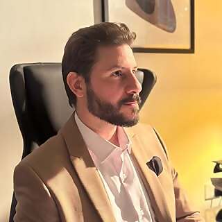 ‎Ali Mansour‎