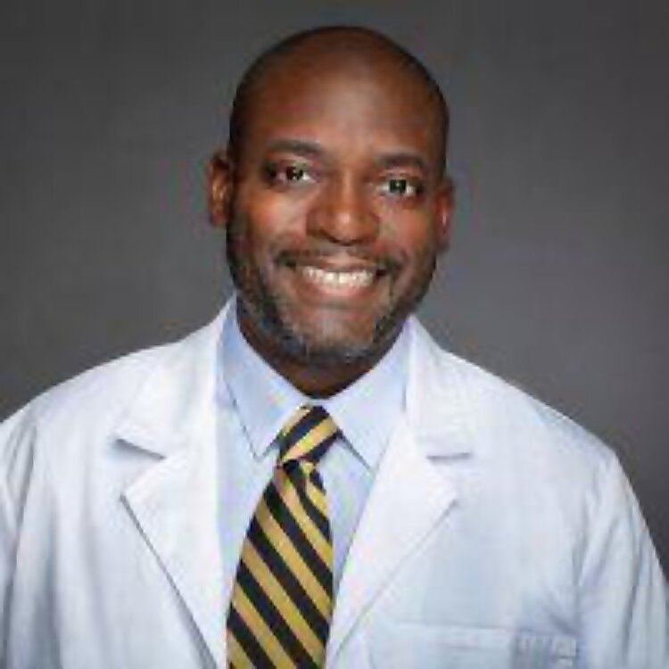 Dr. Charlton Woodly